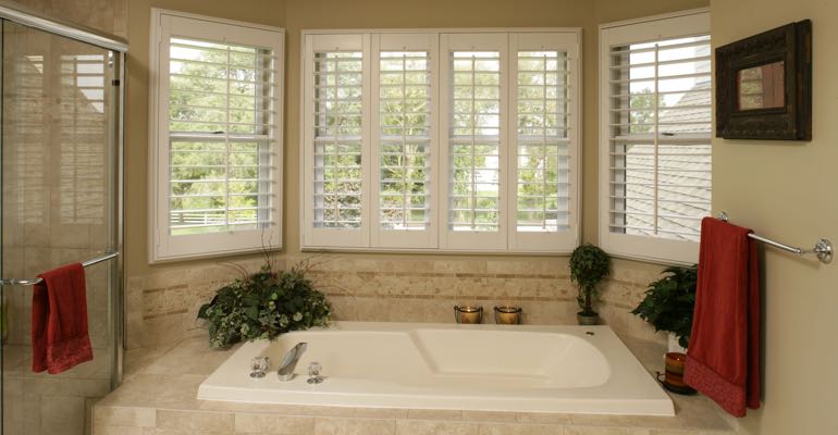 Plantation shutters in Denver bathroom.